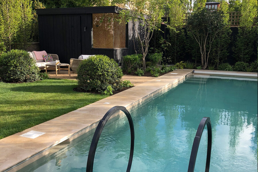 A garden focused around a central swimming pool designed by Studio Ikram